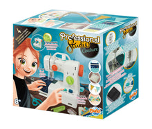 Professional Studio Couture sewing kit retail box with sewing machine and fabric tools