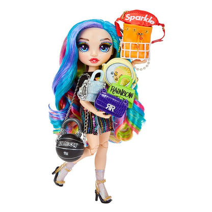 Mini handbag with chain strap in rainbow colors, held by a fashion doll