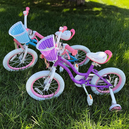 Kids purple bicycle with rear pink training wheels, front basket, and white star decals