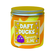Sensory slime jar with orange-and-yellow contents and playful duck label