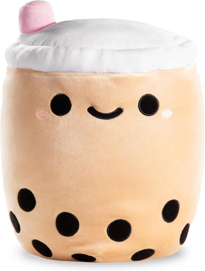 Beige reversible plush cup with black dot face and white lid with pink top