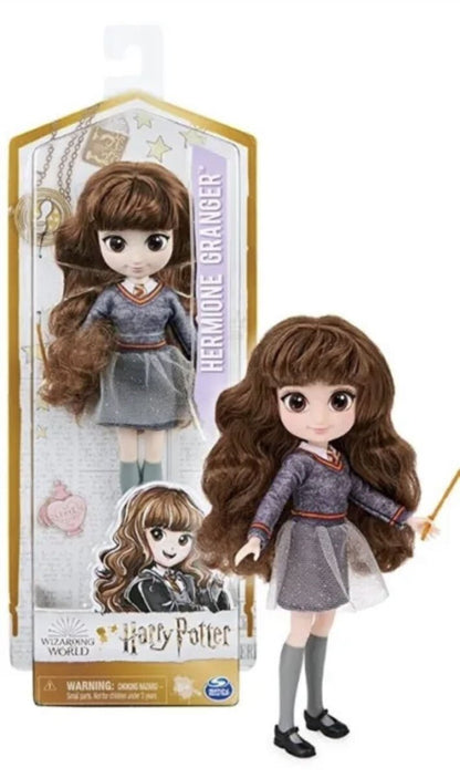 Hermione Granger doll in retail box, wearing blue dress with orange trim