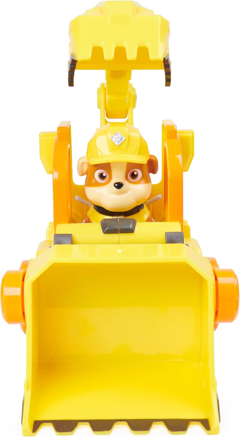 Close-up: Rubble figure in yellow bulldozer cockpit with front scoop blade
