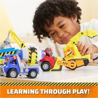 Yellow Rubble bulldozer toy with extended scoop and figure cab during play
