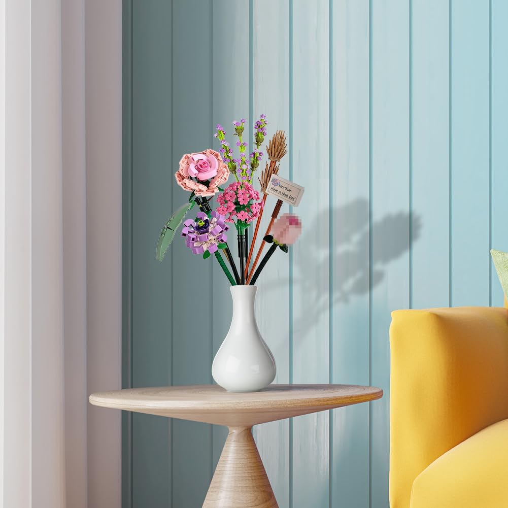Mini flower building set in vase: pink, purple, and tan flower stems with leaves