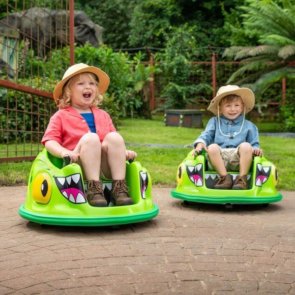 Green electric dinosaur bumper ride-on car with cartoon face, two children seated