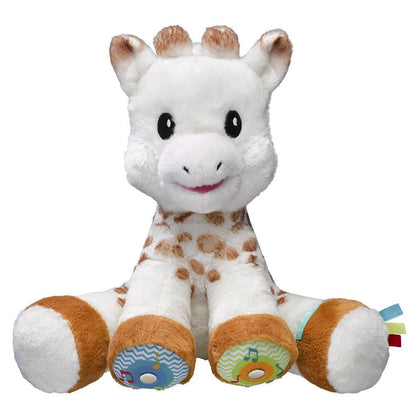 Sophie la girafe plush giraffe, white with brown patches, textured feet and tags