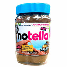 Slime bucket with blue lid and hazelnut-brown, spread-like contents