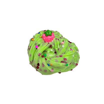 Green glow-in-the-dark slime ball with pink charm and colorful confetti flakes