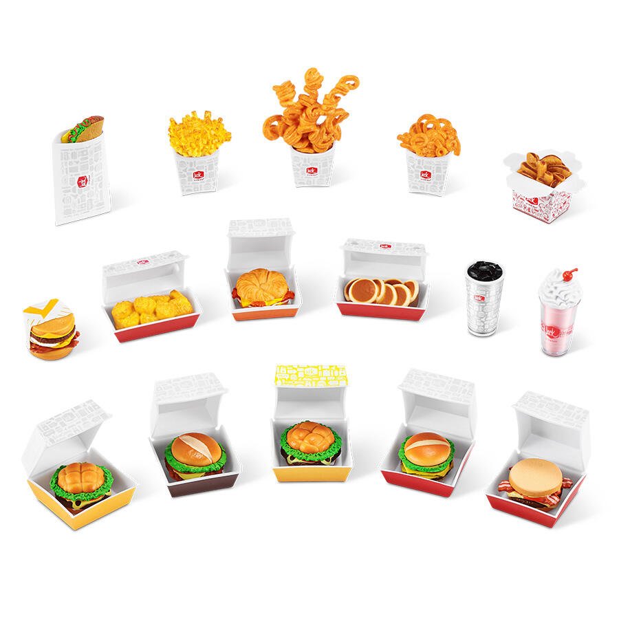 Assorted mini food collectible packages with red and orange snack items in open trays