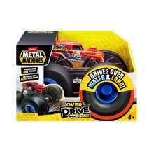 Red metal all-terrain monster truck toy with oversized blue wheels, in box