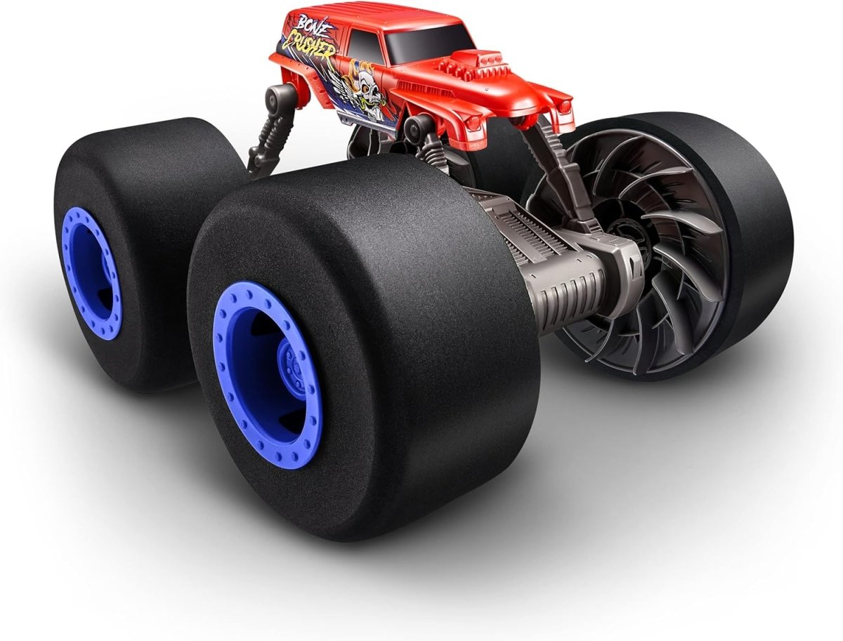 Red metal all-terrain monster truck toy with four large blue-rimmed tires
